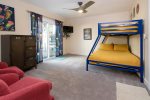 The third bedroom has a twin over full bunk plus TV